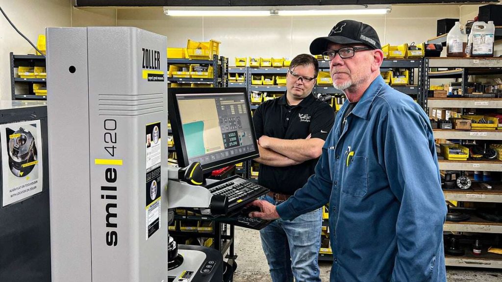 Eagle CNC staff working with the SMILE 420 tool presetting and measuring machine